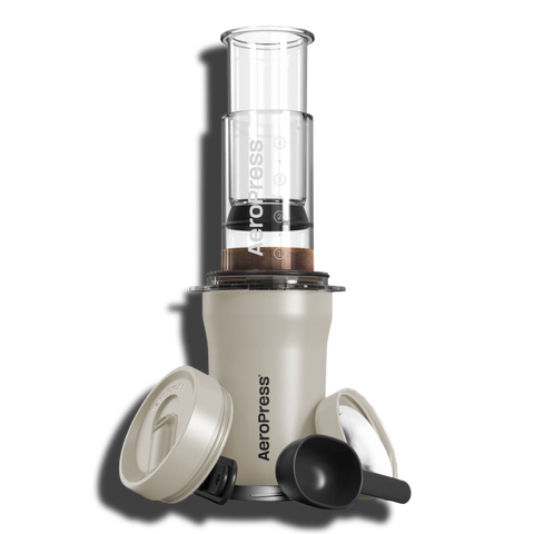 Aeropress coffee maker with a white background paradigm spark