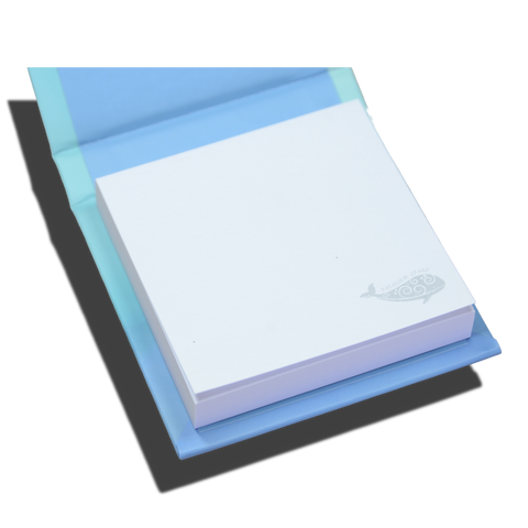 Stack of white notepads with a blue border on a white background paradigm spark